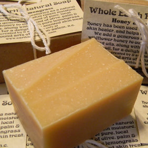 Photograph of a bar of Earthbound Arts honey lemongrass soap