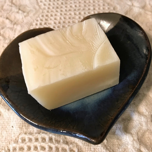 Photograph of a bar of Earthbound Arts tea tree peppermint soap